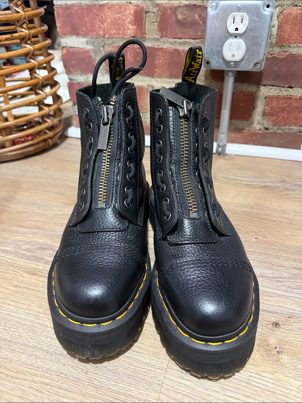 Dr. Martens Black Leather Platform Boots with Yellow Stitching and Front Zippers